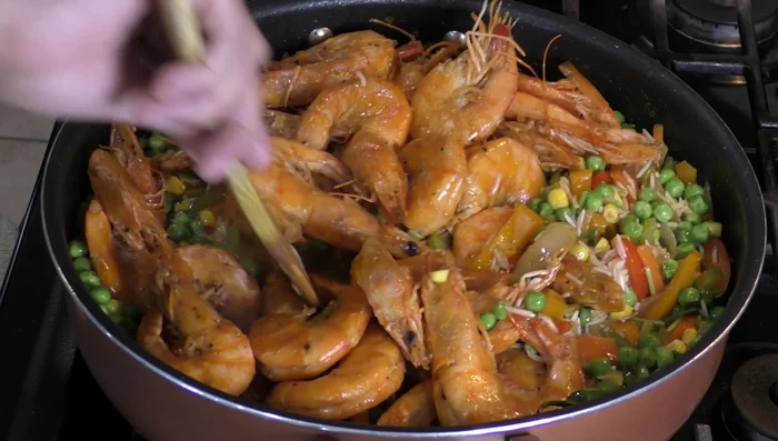 Cover the pot, reduce heat to medium, and simmer for approximately 25 minutes, or until the water is absorbed.