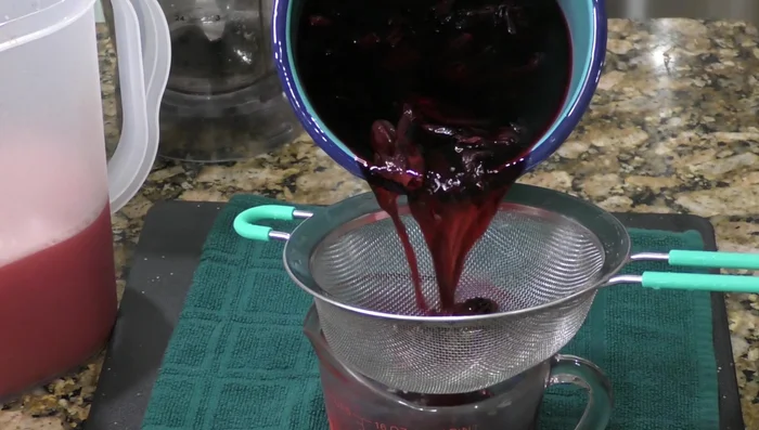 Strain the hibiscus tea.