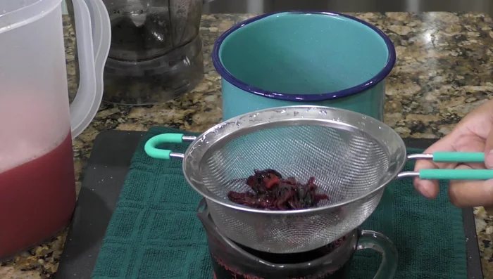 Combine the strained watermelon mixture, hibiscus tea, and remaining water in a pitcher.