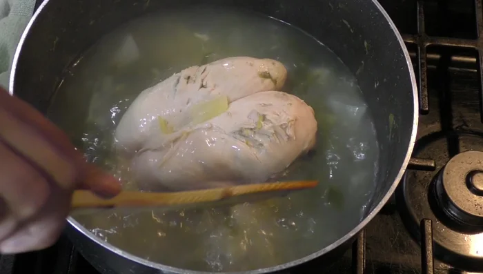 Once cooked, remove chicken and let cool. Shred the chicken.