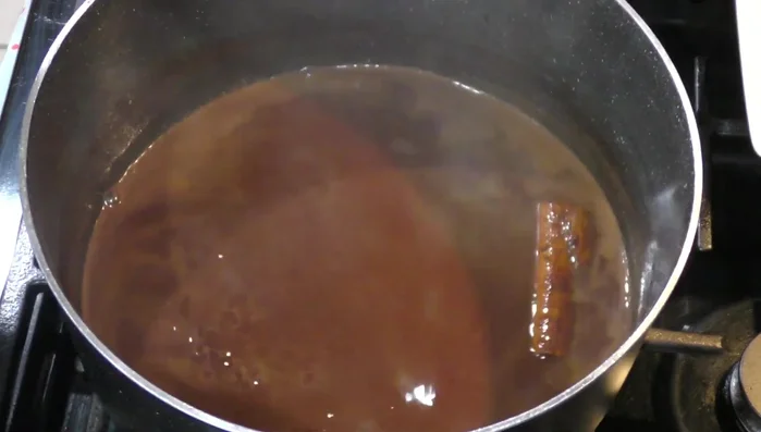 Add the milk to the melted chocolate mixture.