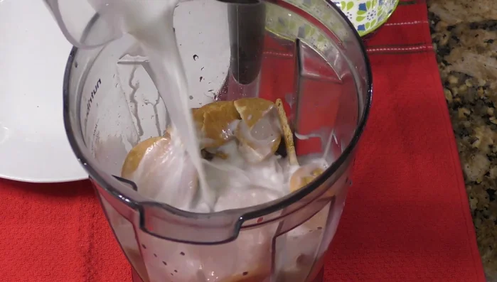 Add the vanilla extract to the blended mixture.