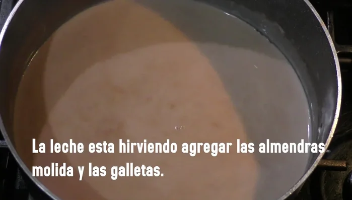 Add the blended mixture to the boiling milk and chocolate mixture.
