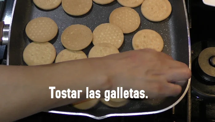 Toast the Maria cookies in a separate pan until golden brown.