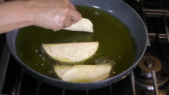 Carefully fry the quesadillas until golden brown. [211.48]