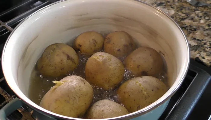 Cook potatoes in enough water until tender. [70.159]