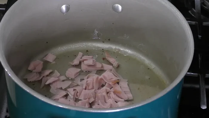Fry ham and sausages in the bacon fat.