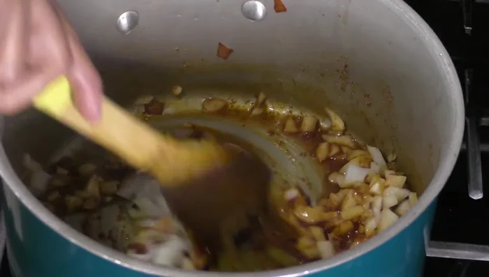 Add chorizo and fried onion; cook for 15 minutes.