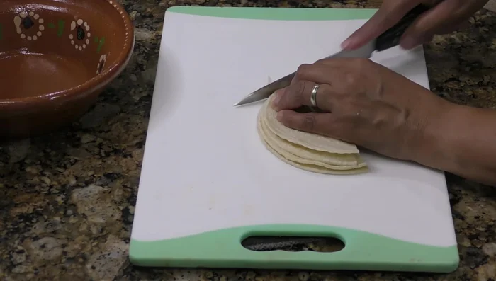 Cut tortillas into thin strips (329.16).