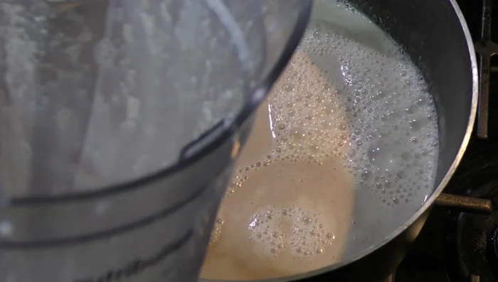 Add the remaining milk. [123.42]