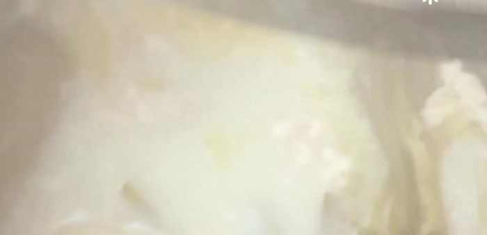 After two hours (when the corn is popped), add salt to taste. Cover and cook for another 30 minutes.