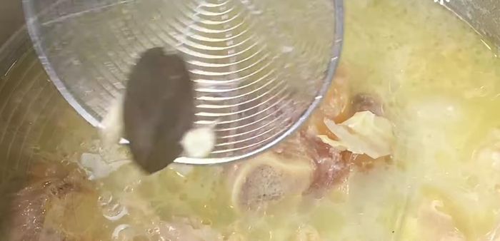 Remove the chili, onion, bay leaf, and garlic.