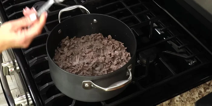Season the meat with salt and pepper to taste.