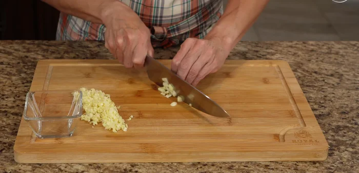 Finely chop the garlic cloves.