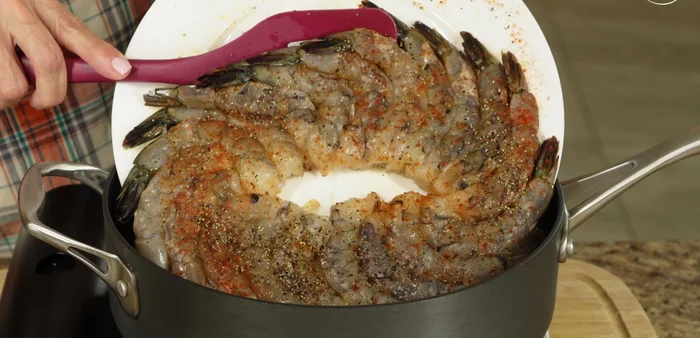 Add the shrimp in a single layer and cook for about 2 minutes per side, without stirring.