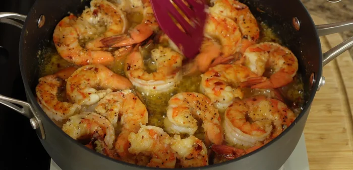 Add lemon juice and parsley. Mix gently.