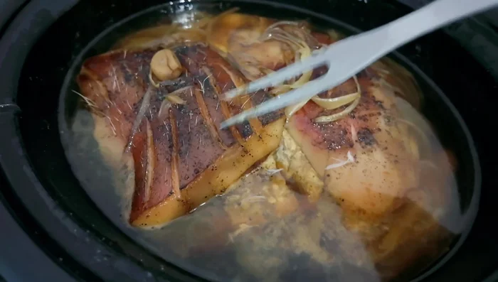 Separate the crackling and shred the pork meat.