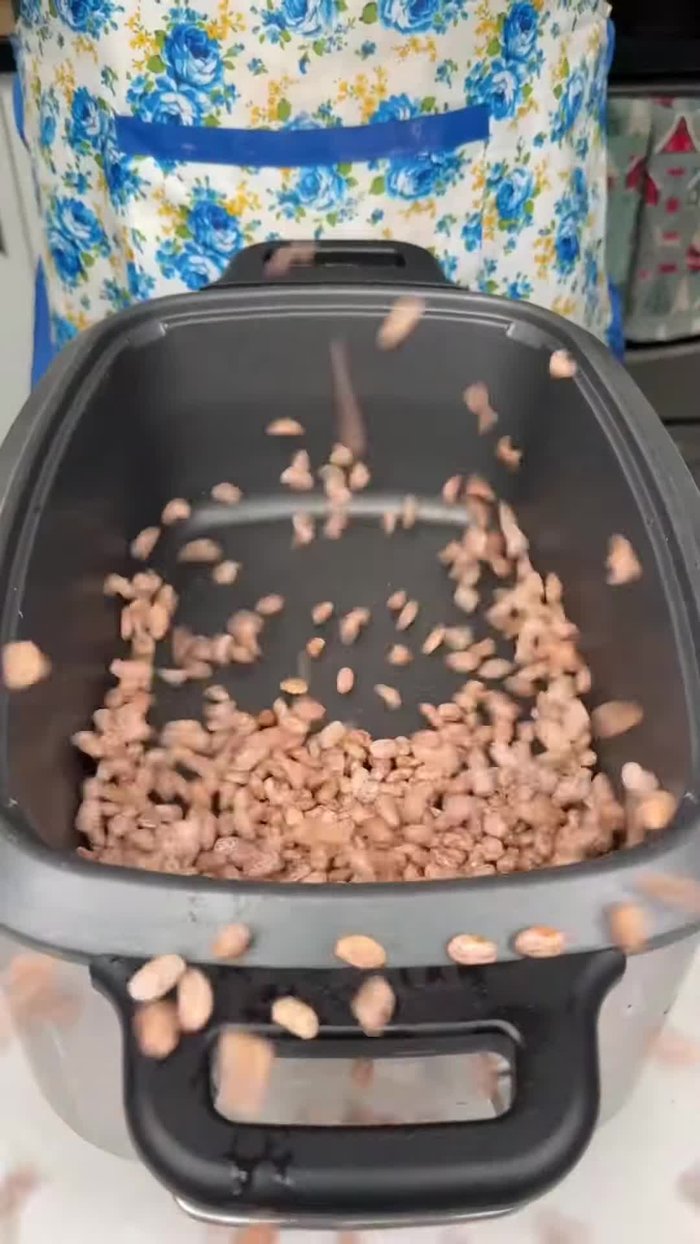 Rinse and drain one pound of pinto beans. Add them to your slow cooker.