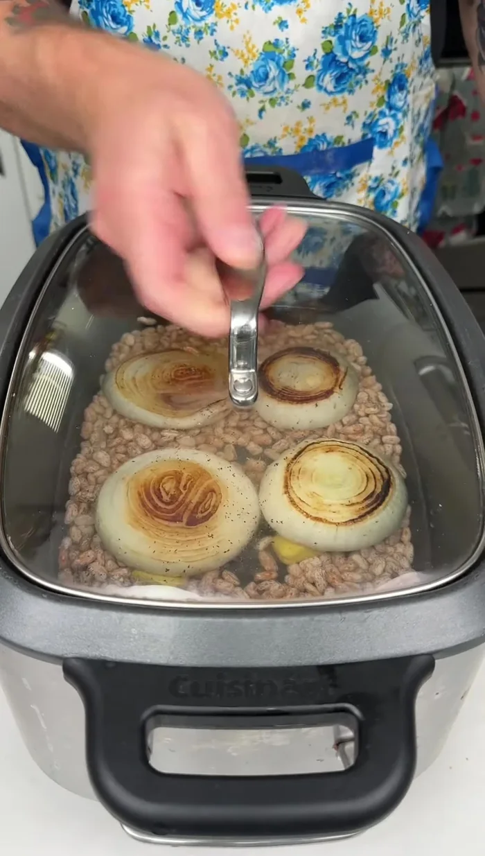 Add six cups of water to the slow cooker. Put the lid on and set the temperature to high for 6 hours.