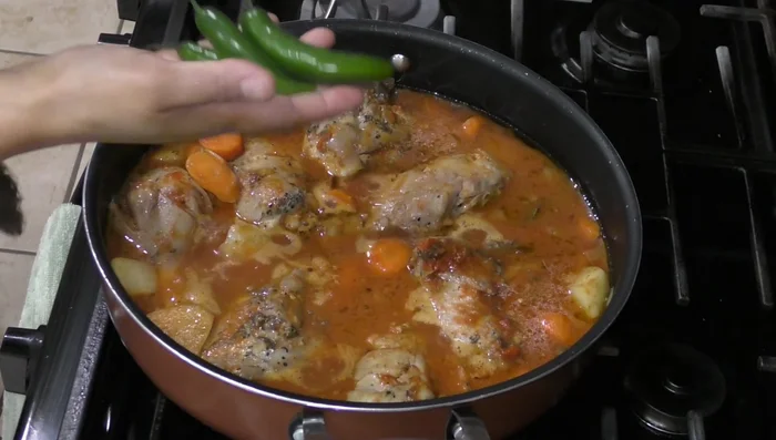 Cover and cook over medium heat for 25 minutes, or until the chicken and vegetables are tender.
