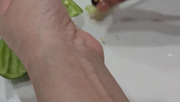 Remove chili seeds (if using jalapeno) and finely chop the garlic, tomato, onion, and cilantro.
