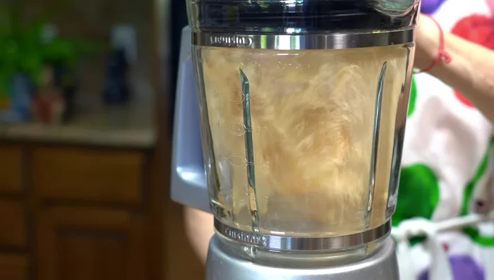 Cool potatoes, peel, and mash.