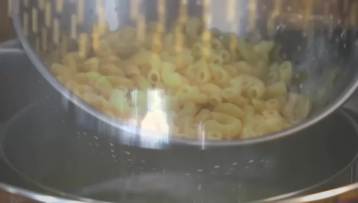 Drain and cool pasta.