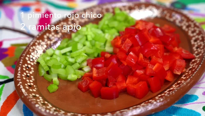 Chop red pepper and celery.