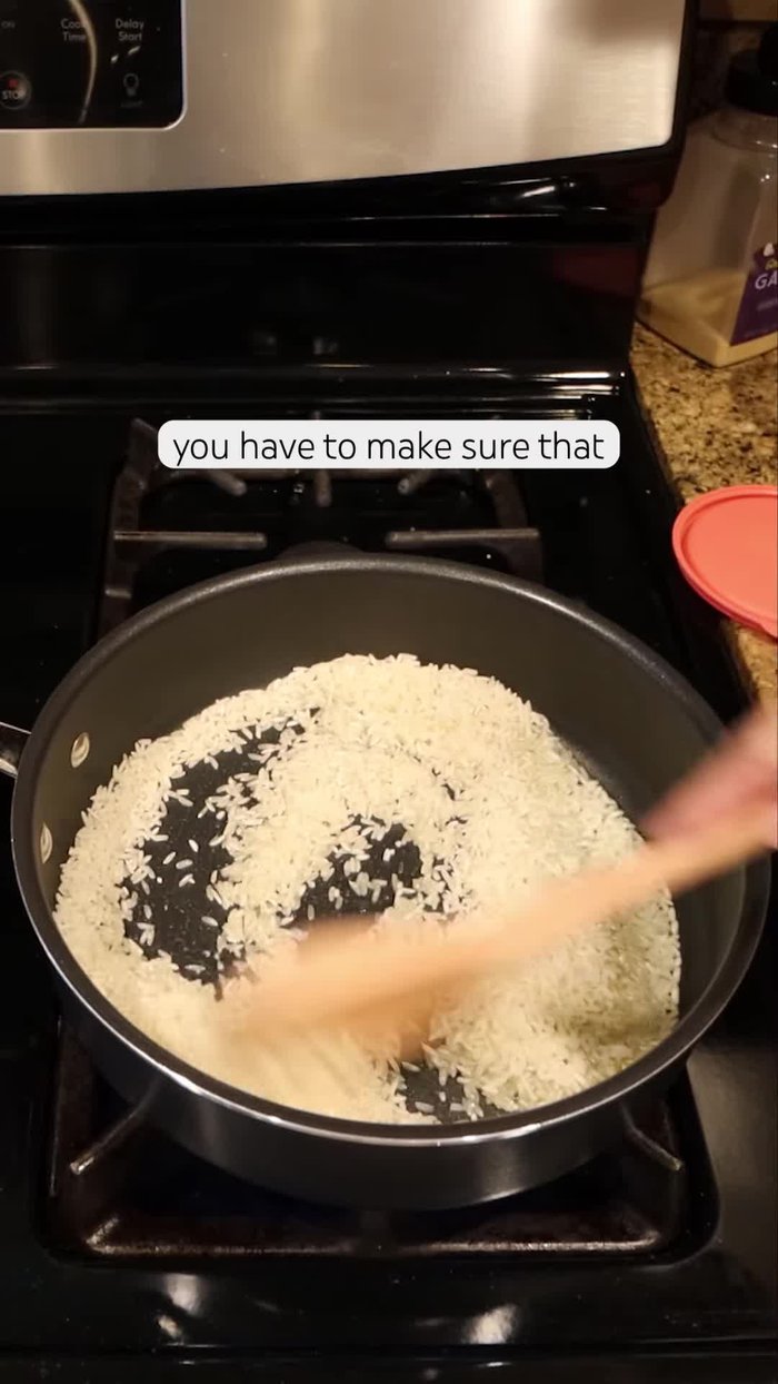 Add 1 cup of extra long grain white rice and stir until golden brown. Make sure the rice is coated in oil and constantly stir.
