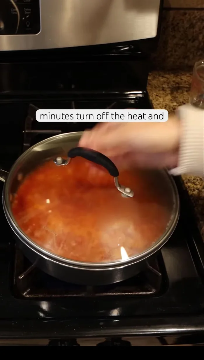 Turn off the heat and let the pan cool for 10 minutes to allow the steam to continue cooking and fluff up the rice.