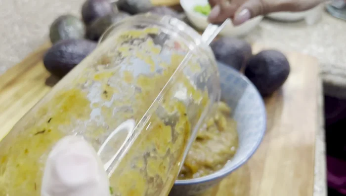 Add chopped cilantro and lime juice to cooked rice. [516.8]