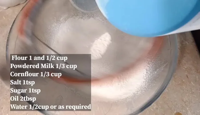 Prepare the tortilla dough: Combine refined flour, cornflour, milk powder, salt, water, and oil. Knead until smooth. Let it rest.