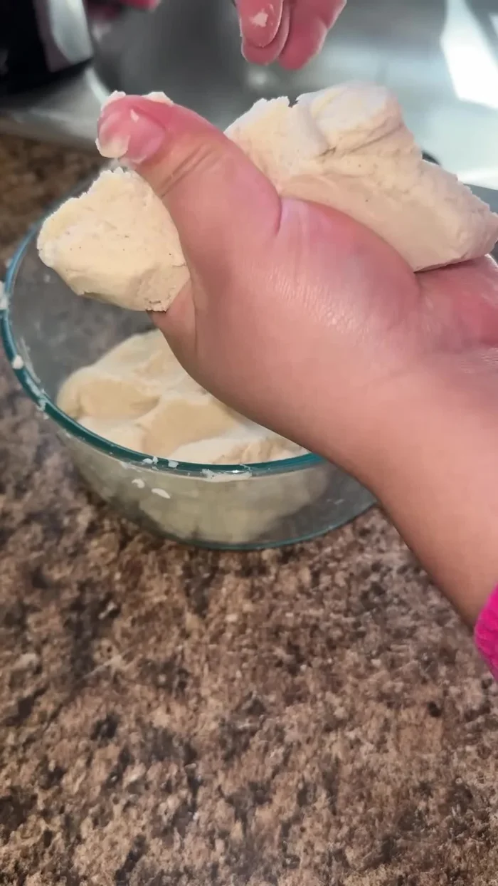 Knead the dough for about 5 minutes until it's smooth, fluffy, and soft.