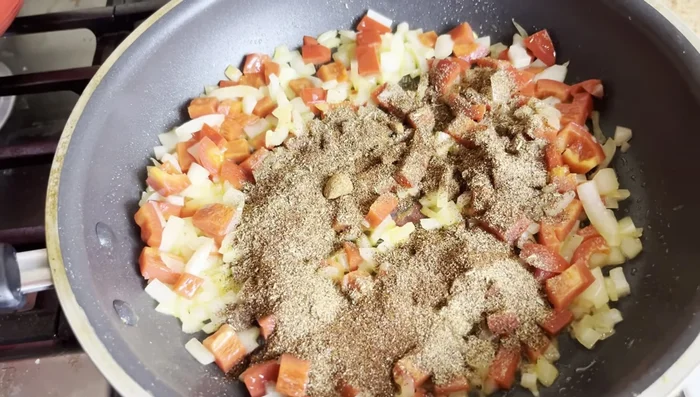 Add spices (cumin, garlic powder, onion powder, salt, pepper) to the skillet and cook for a few minutes to bloom the flavors.