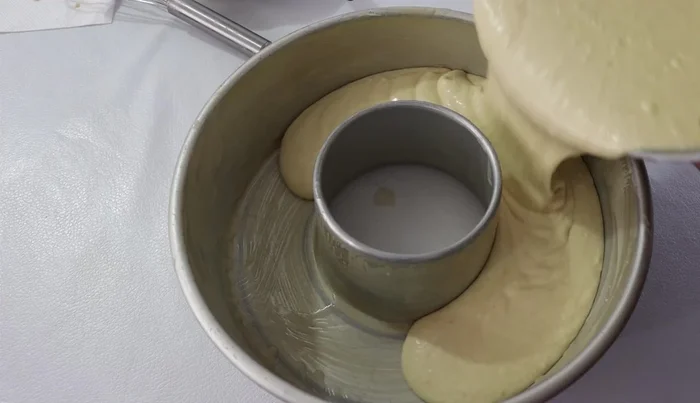 Pour the batter into the prepared mold (fill to ¾ full).