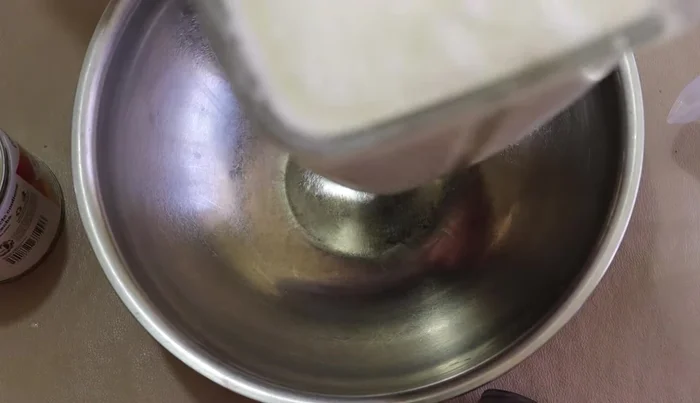 In a large bowl or jug, combine the blended milk mixture with water and rompope.