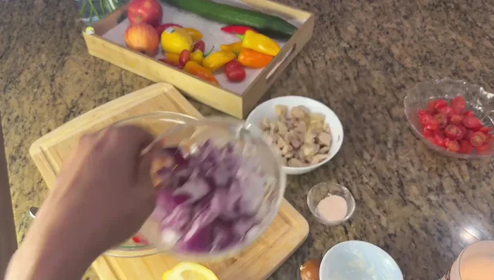 Add chopped vegetables and chicken to the avocado mixture; stir until evenly coated.