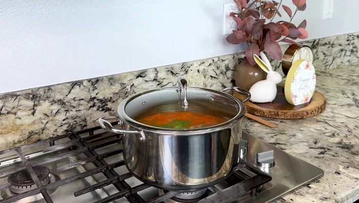 Add a small bunch of cilantro. Cover and cook for 7 minutes.