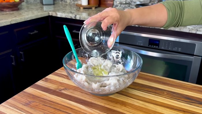 Add 1 egg white, 1/2 teaspoon black pepper, 1 teaspoon each of garlic powder and onion powder, cilantro, and salt to taste. Mix well.