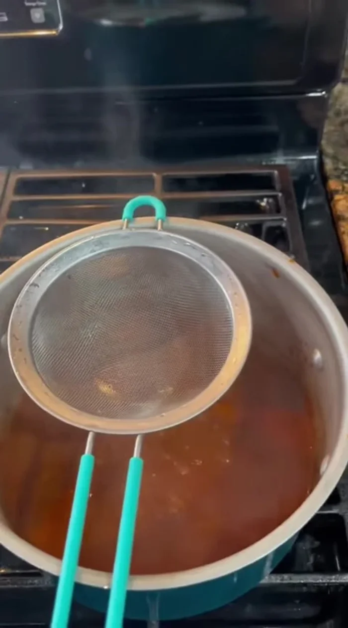 Strain the shrimp mixture.