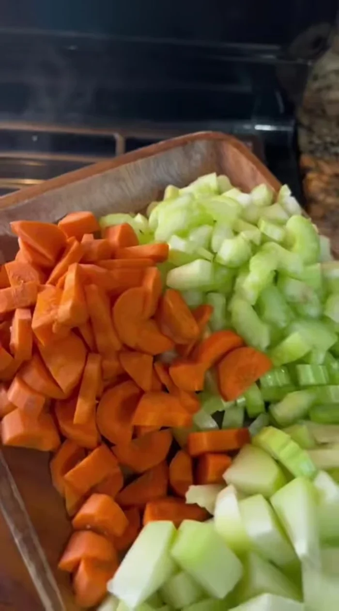 Add carrots, celery, chayote, and potato. Cook for 15 minutes.