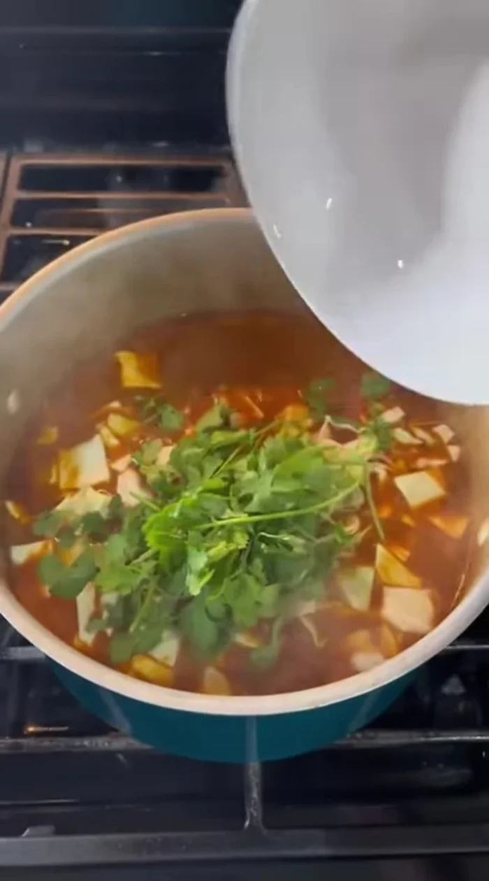 Stir in cilantro and salt to taste.