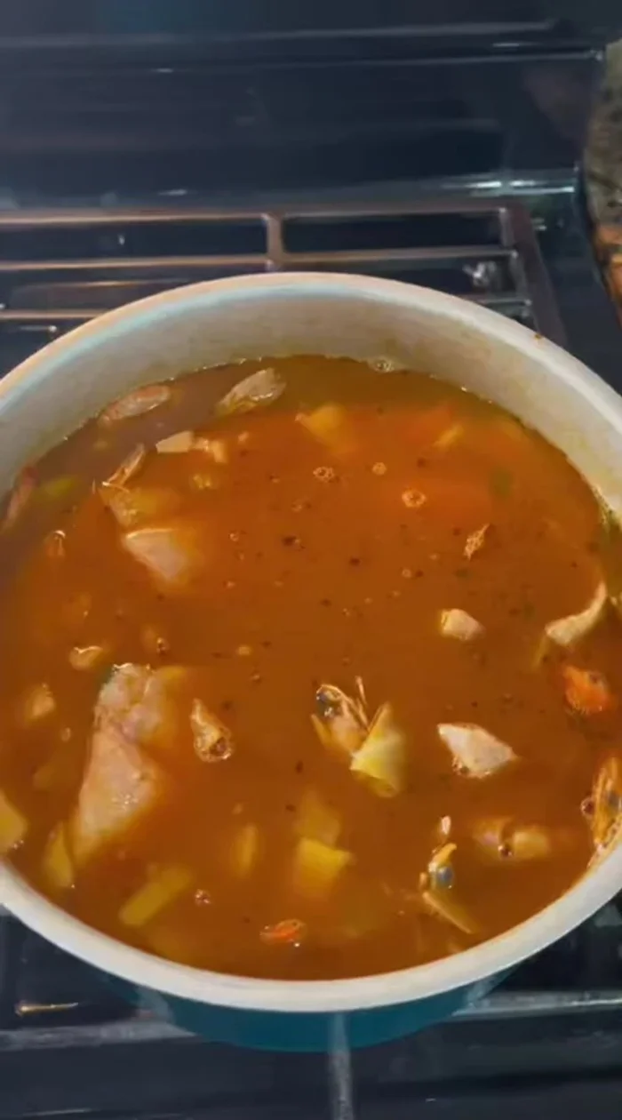 Add the cut fish and cook for 7 minutes, covered.