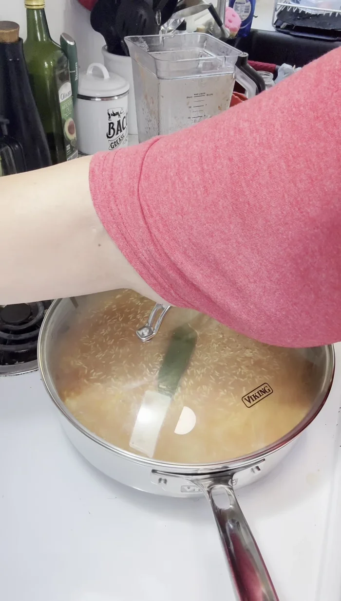 Cover the pan and cook on medium-low heat for approximately 14-15 minutes.
