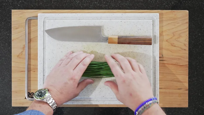 Finely chop the chives.