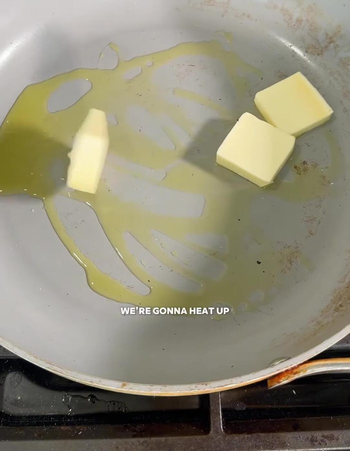 Heat up oil and butter in a pan. Add the onion and cook until translucent.