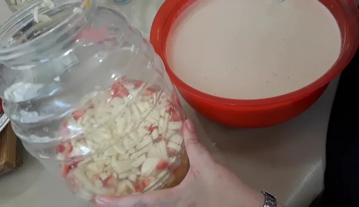 Add the chopped fruits to the fruit pulp mixture.