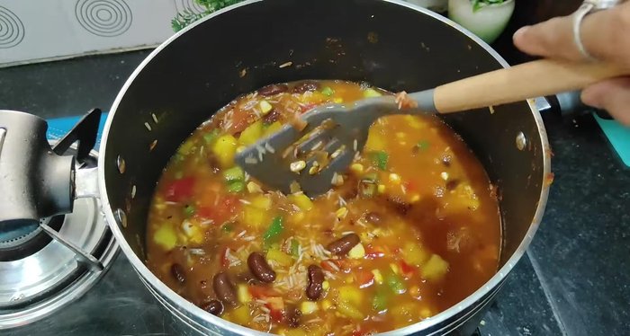 Bring to a boil, then cover, reduce heat, and simmer for 15 minutes until rice is cooked and water is absorbed.