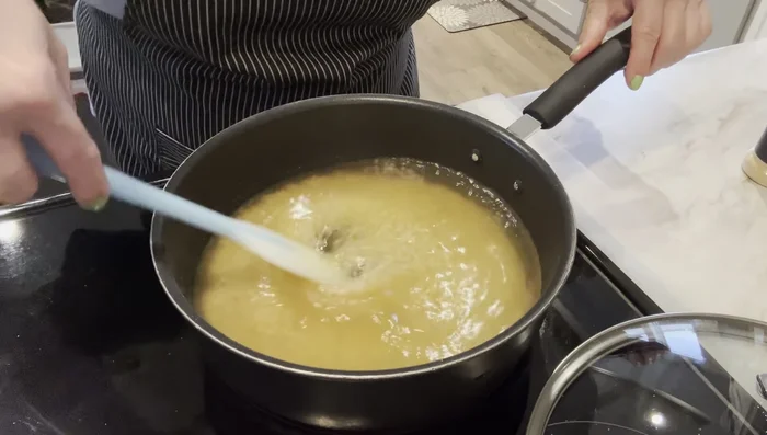 Pour in 2 cups of chicken broth (or vegetable broth).