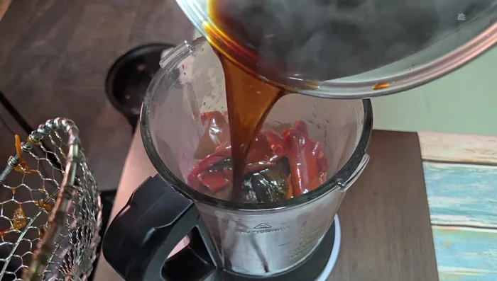 Blend softened chilies with some soaking water until smooth. Add garlic, cumin, salt, pepper, and oregano.